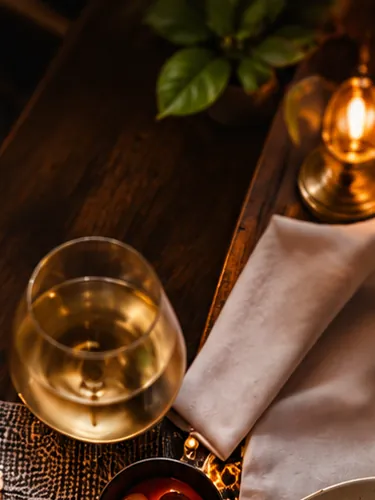 Candles, wine and a quiet table at Cafe Ember
